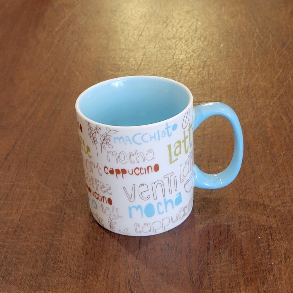 2007 Starbucks 16oz Coffee  Language Light Blue Coffee Cup Mug